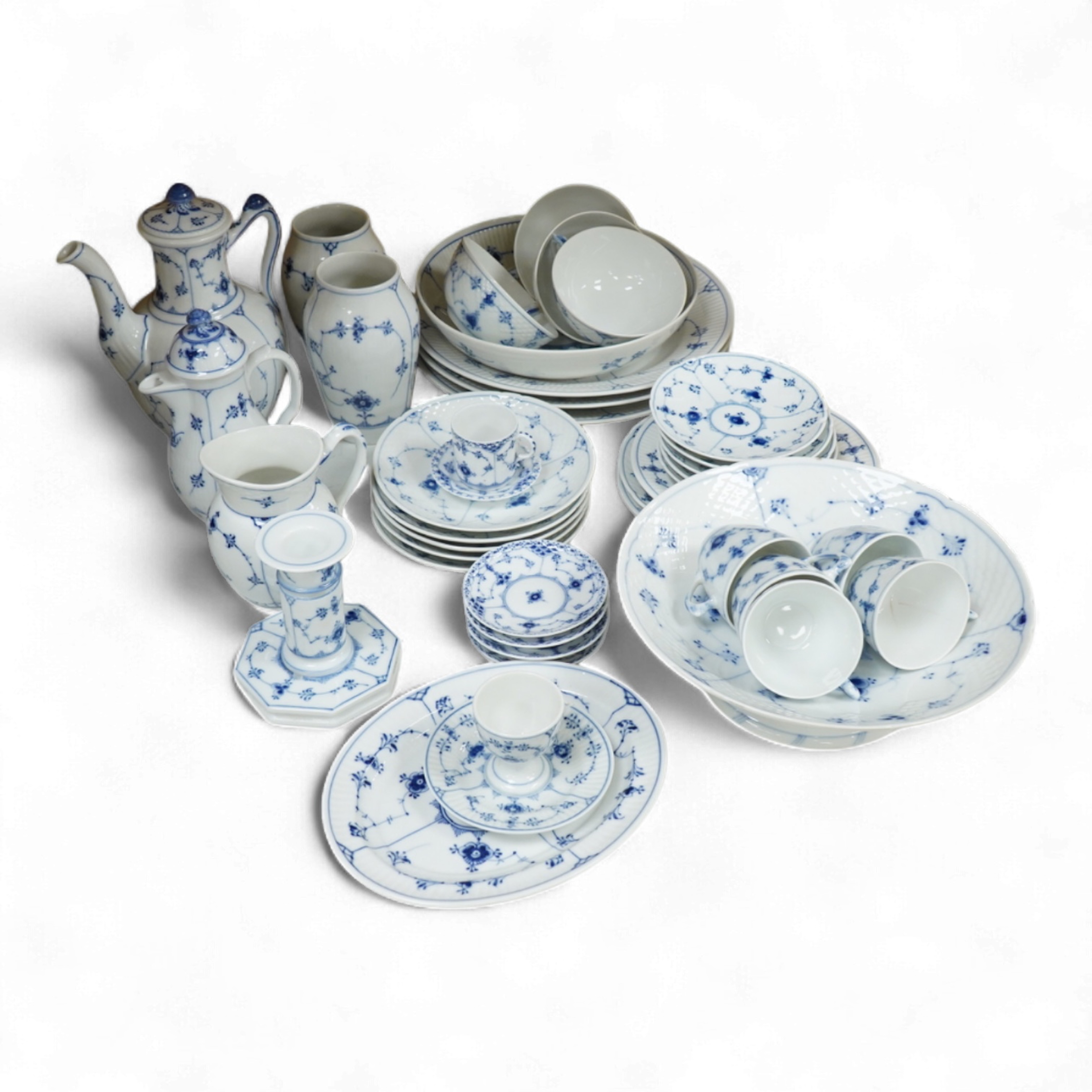 A collection of Royal Copenhagen and Bing & Grondahl onion pattern blue and white tableware